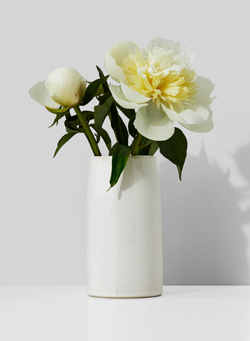 Vase de potier en céramique blanche de 14 cm de haut